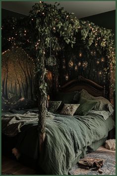 a canopy bed with lights hanging from it's sides and trees on the wall