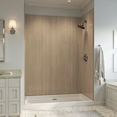 a bathroom with a walk in shower next to a sink