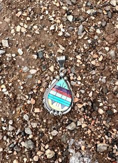 This Zuni pendant is an inch in length with beautiful vibrant colors, it's vintage in our Rodgers Collection. Handmade in the USA Vibrant Colors, Pendant, Color