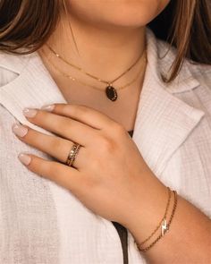 This classic Oval Name Necklace is crafted from 14K yellow gold-filled or sterling silver and features an 18" venetian box chain and an undarkened name stamped around the side edge. An ideal graduation, bridesmaid gift, or birthday gift for a special someone, this necklace is the perfect way to show them how much you care. Let us know the name or date you'd like stamped in the notes at checkout. Box Chain, Bridesmaid Gift, Name Necklace, Bridesmaid Gifts, Gold Filled, Birthday Gift, Birthday Gifts, Yellow Gold, Sterling Silver