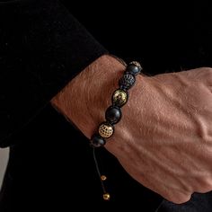 Discover the essence of modern style with our Pinnacle Gift Set for Men. This curated necklace and bracelet set showcases a luxurious combination of black agate gemstones paired with silver and gold pave´ CZ beads. This dazzling duo is the set you need if you like to be the best dressed wherever you go. Included: Necklace + Bracelet Black Agate Disk Beads, 10mm Gold and Silver Pave´ CZ Beads, 10mm Properties: Focus, Clarity, Strength Necklace Length: 32 inches Bracelet Size: Macrame Adjustable S Luxury Beaded Bracelets For Everyday, Luxury Gold Beaded Gemstone Bracelets, Luxury Polished Beads Jewelry As Gift, Luxury Polished Beads Jewelry For Gifts, Luxury Polished Beads Jewelry Gift, Luxury Adjustable Gemstone Beads Jewelry, Luxury Gold Beaded Bracelets With Gemstones, Luxury Gold Beaded Bracelet With Gemstones, Luxury Onyx Jewelry With Black Beads