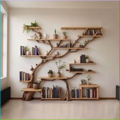 a tree shelf with books and plants on it in a room that has white walls