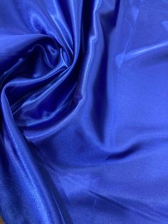 High quality Charmeuse Medium Satin Lining Fabric. Smooth, lustrous fabric constructed with a satin weave. Beautiful on wedding dresses, evening gowns, dance costumes, and more. Washing Instructions: Machine wash gentle low tumble dry. Hand wash and hang dry preferred. Content: 100% Polyester / Minimum Order: 1 Yard / Size: Approximately 60" Wide / Ships within 24 business hours. Colors: This product comes in 40 different colors. Blue Satin Dress For Prom, Blue Satin Wedding Dress, Blue Satin Dress For Wedding With Satin Finish, Blue Satin Dress For Wedding, Blue Silk Satin Wedding Dress, Dresses Dance, Quinceanera Dress, Lace Evening Dresses, Lilac Color