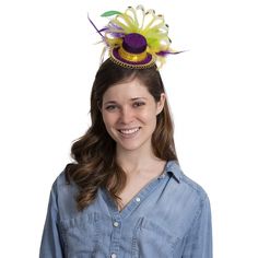 Skeleteen Purple Top Hat Headband is the perfect accessory for Mardi Gras. The hat is 5 inches long and has colorful feathers and sequins. the headband has comb like ridges to secure it on your head. This cute hat can also be worn for Halloween and will make a great statement at any party. Give this headband to a child who loves pretend play and dress up, and he will be ecstatic with the new addition to his costume chest! The headband is made of high quality materials. Fun Adjustable Mini Hats For Carnival, Adjustable Carnival Costume Hats And Headpieces, Adjustable Headband Costume Hats For Carnival, Adjustable Novelty Headpieces For Carnival, Novelty Adjustable Headpiece For Carnival, Fun Adjustable Carnival Headpiece, Novelty Adjustable Headband For Carnival, Adjustable Multicolor Novelty Costume Hats And Headpieces, Adjustable Hat For Carnival