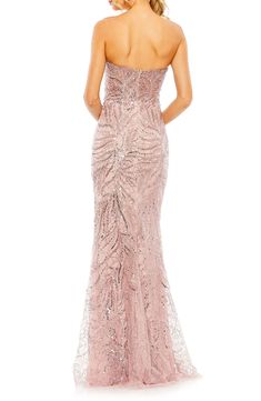 Icy sequins and a corset-inspired bodice add visual intrigue to a sleeveless gown styled in a sleek column silhouette. 41" length Hidden back-zip closure Sweetheart neck Strapless Lined 100% polyester Spot clean Imported Asian Owned/Founded Robe Fuchsia, Champagne Formal Dresses, Blush Prom Dress, Orange Prom Dresses, Navy Blue Prom Dresses, Vestidos Color Rosa, Red Sequin Dress, Navy Blue Bridesmaid Dresses, Fuchsia Dress