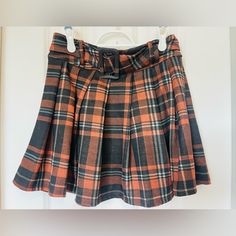 Nwt- Plaid Skirt With Matching Belt. Material Is Very Comfortable And Relaxed. Color Is Like A Light Brown Or Burnt Orange And Black. Orange Skirt, Plaid Skirt, Plaid Skirts, Black Orange, Burnt Orange, Orange Black, Light Brown, Womens Skirt, Plaid