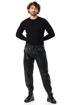 Clearance sale. Men's leather pants are made of high-quality Turkish lambskin leather.Men's opulent, high-end leather pants for dressing up.There are no returns on sale items.We anticipate exchanges in 14 days.Elastic waistband. 2 side pockets and 2 back pockets the ankle closure is zippered. ankle elastic bandCold-weather essentials are perfect for winter or spring. Liner inside.made in Turkey.The model stands 6 feet tall, and he is wearing a size large.perfect gift for Christmas. new year eve, Mens Leather Pants, New Year Eve, Huge Sale, Clearance Sale, Lambskin Leather, Large Black, Leather Men, Soft Leather, Sale Items