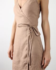 "FABRIC: 100% Softened Lithuanian Linen COLOR: Please choose the desired color from the side menu. STYLE: Knee-length linen wrap dress with adjustable spaghetti straps. SIZE CHART: 2 US/ 6 AU/ 34 EU: Bust 31.5\" (80 cm) , Waist 23\" (59 cm), Hips 35\" (88 cm) 4 US/ 8 AU/ 36 EU: Bust 33\" (84 cm) , Waist 25\" (63,5 cm), Hips 36\" (92 cm) 6 US/ 10 AU/ 38 EU: Bust 35\" (88 cm) , Waist 26,5\" (67,5 cm), Hips 38\" (96 cm) 8 US/ 12 AU/ 40 EU: Bust 36\" (92 cm), Waist 28\" (72 cm), Hips 39\"(100 cm) 10 Navy Dress Outfits, Eden Dress, Natural Linen Dress, Linen Wrap Dress, Linen Fashion, Summer Linen Dresses, Linen Color, Dress Linen, Summer Linen