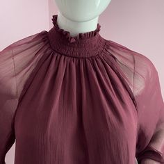 Underarm To Underarm 19" Shoulder To Hem 25" Msrp $278.00 100% Polyester Joie Women Top Long Sleeve - Sleeves Are Sheer Smocked Blouse - Mock Turtle Neck Is Smocked Dark Red / Maroon Baseball Sleeve Size Medium Underarm To Underarm 21" Colar To Hem 28" 2024/At Flowy Blouse With Smocked Back, Feminine Fall Smocked Top With Smocked Back, Flowy Smock Blouse, Feminine Smocked Top With Smocked Back For Fall, Fall Feminine Smocked Top With Smocked Back, Chic Smock Tops In Solid Color, Chic Flowy Blouse With Smocked Bodice, Chic Smocked Top With Lantern Sleeves For Fall, Fall Blouse With Smocked Back For Daywear