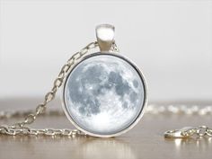 Full Moon Necklace  Pendant Size: 30mm tall X 25mm (25mm=1inch) Image Size Approx.: 25mm (25mm=1inch) Chain Length:  Choose your own length These are MADE TO ORDER, handmade pieces, so each will vary slightly as they are one of a kind! Due to the nature of handmade items, tiny, nearly unnoticeable imperfections may exist in each piece that do not detract from their quality or appearance.  These are handmade, made-to-order items -- they are made just for you when you order your piece!  Please all Nickel Free White Moon-shaped Jewelry, Silver Moon Print Round Jewelry, White Moon Phase Necklace, White Half Moon Jewelry For Gift, Full Moon Necklace, Pretty Jewelry, Moon Charm, Moon Pendant, Moon Necklace