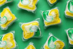 some white and yellow candy on a green surface