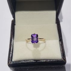 14k solid yellow gold natural emerald cut shaped amethyst gemstones ring. 1. The weight of the natural amethyst gemstone used in the ring =1.50 cts. 2. The weight of the 14k solid yellow gold used in the ring =1.170 grms. 3. The amethyst is the birthstone for the people born in the month of February. 4. The design of the ring is very nice and beautiful. 5. I have used all my skills and experience to manufacture this ring as beautiful as I can and I do hope that my work will be appreciated. Thank Yellow Gold Amethyst Ring With Emerald Cut, Rectangular Amethyst Ring In Yellow Gold, Gold Amethyst Ring With Emerald Cut, Birthstone, Gold Emerald Cut Amethyst Birthstone Ring, 14k Yellow Gold Emerald-cut Amethyst Ring, Classic Octagon Amethyst Ring As A Gift, Yellow Gold Amethyst Ring With Rectangular Shape, Classic Octagon Amethyst Ring As Gift, Classic Octagon Amethyst Ring For Gift