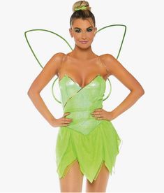 a woman in a green fairy costume