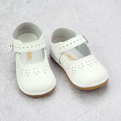 Angel Baby Girls White Leather Scalloped Mary Janes - Babychelle.com Soft Sole Closed Toe Mary Janes, Soft Sole Mary Janes, Cute White Mary Janes For Spring, White Leather Mary Janes With Buckle Closure, White Non-slip Mary Janes With Round Toe, Classic White Closed Toe Mary Janes, White Mary Janes With Buckle Closure For Spring, Classic White Mary Janes For Spring, Classic White Mary Janes With Round Toe