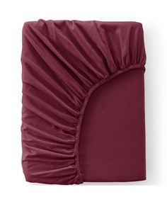 a maroon sheet with ruffles on it