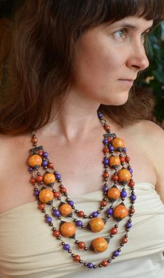 Adjustable Orange Multi-strand Necklaces, Handmade Orange Multi-strand Necklace, Bohemian Orange Long Necklace, Bohemian Orange Necklaces With Wooden Beads, Bohemian Orange Necklace With Wooden Beads, Handmade Orange Long Necklace, Handmade Orange Necklace, Handmade Orange Multi-strand Jewelry, Unique Orange Necklace With Wooden Beads