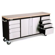 a white and black workbench with drawers