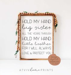 a sign that says hold my hand big sister all the years through holding my hand little brother for i will always love & protect you