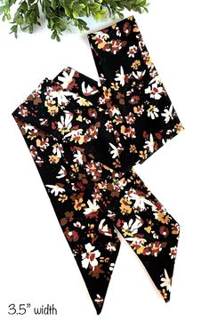 "This versatile pretty black abstract floral boho sash/belt will make a statement no matter what outfit you choose to style it with.  Looks beautiful with a dress or can be playful and chic when paired with your favorite slacks or jeans.  Elevate a solid colored top when worn as a neck scarf.  The 3 1/2 inch width allows you to wear your sash/scarf wide or you can fold it in half widthwise if you like the narrow look.   Wrap your purse handle or your straw hat (60\" is best).  The possibilities Black Floral Print Scarf, Black Bohemian Scarves With Floral Print, Black Bohemian Scarf With Floral Print, Black Bohemian Scarf For Summer, Black Bohemian Summer Scarf, Trendy Black Scarves For Spring, Belt Scarf, Floral Belt, Boho Belt