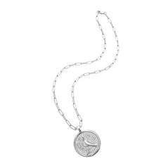 Designed as a touchstone to remember those we have lost. Hold their memory close with this recognition of all they meant to you. A tribute to your relationship and the time spent together, this coin pendant is a token to honor how much you love them still. We wish you peace. Coin pendant made of sterling silver dipped in rhodium, measuring 1.2" in diameter. DOUBLE SIDED: Bird and flowers on one side, JW logo and PEACE inscription on the other. Wear either way! Includes your choice of chain: 18" Memorial Necklace With Round Coin Pendant, Commemoration Necklace With Large Round Pendant, Sterling Silver Medallion Coin Necklace With Chain, Sterling Silver Coin Pendant Necklace For Memorial, Memorial Medallion Necklaces With Coin Pendant, Memorial Necklace With Coin Pendant Medallion, Commemorative Coin Pendant Necklace, Commemoration Necklace With Coin Pendant, Medallion Coin Pendant Necklace For Memorial