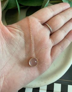 Rose Quartz Necklace Rose Quartz Pendant Necklace In Rose Gold, Rose Gold Pendant Necklace With Rose Quartz, Feminine Rose Gold Pendant Necklaces, Dainty Rose Quartz Jewelry In Rose Gold, Feminine Rose Gold Rose Quartz Necklaces, Delicate Pink Gold Round Jewelry, Delicate Rose Gold Gemstone Necklaces, Delicate Rose Gold Gemstone Necklace, Feminine Rose Quartz Rose Gold Jewelry