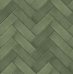 an image of a green textured wallpaper with herringbones in the pattern