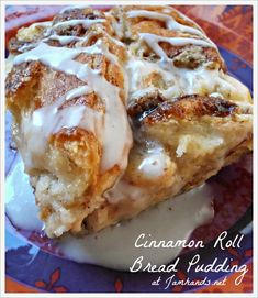 cinnamon roll bread pudding on a plate with icing