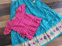 This Lehenga suits 9 yr - 10 yr. Kindly please contact us if needed measurements before purchase. Traditional Pink Choli With Short Sleeves, Traditional Pink Short Sleeve Choli, Fitted Traditional Set With Short Sleeves, Pink Short Sleeve Traditional Wear, Fitted Banarasi Silk Sets In Blue, Festive Designer Wear Sets With Short Sleeves, Silk Sets With Traditional Patterns In Pink, Fitted Silk Sets With Traditional Patterns, Pink Silk Sets With Traditional Patterns