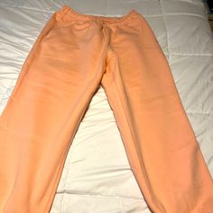 Nwt Nike Sweats Size Xl Peach Color- The Camera Didn’t Pick Up What A Great Color These Are! Zippered Pockets Drawstring Waist Exercise Or Lounge In These Comfy Thick Sweats Bought In Switzerland So I Can’t Return Them - My Loss Is Your Gain! Casual Peach Pants For Spring, Spring Peach Bottoms For Loungewear, Nike Casual Pants For Spring, Casual Peach Bottoms For Spring, Nike Bottoms For Spring Loungewear, Nike Pink Pants For Loungewear, Nike Pink Lounge Pants, Nike Pink Loungewear Pants, Spring Nike Pants