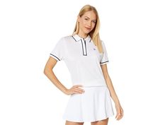 Original Penguin Golf Performance Short Sleeve Veronica Polo - Women's Clothing : Bright White : Slay the game donning the super comfy Original Penguin Golf Performance Short Sleeve Veronica Polo shirt. Pullover style. Classic polo collar and short sleeves. Buttoned front placket. Embroidered brand logo on the left chest. Straight hem with side split. 90% polyester, 10% elastane. Machine wash, tumble dry. Imported. Measurements: Length: 25 in Sleeve Length: 10 in Product measurements were taken White Short Sleeve Polo Shirt With Ribbed Collar, Collared Polo Shirt For Golf In Athleisure Style, Athleisure Collared Polo Shirt For Golf, Sporty Collared Tops For Golf, White Sporty Polo Shirt With Collared Neckline, Collared Moisture-wicking Golf Top, Collared Moisture-wicking Tops For Golf, Moisture-wicking Collared Golf Tops, White Moisture-wicking Collared Polo Shirt