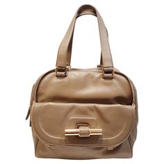 JIMMY CHOO bag Boston Justine model in taupe Taupe leather, gold trim, two flat leather handles, front patch pocket and flap pocket with zip, double top zip, beige canvas lining, one inside zip pocket. Width: 25 cm 9,84 inches Height: 23 cm 9,05 inches Depth: 15cm 5,90 inches Material: Leather Color: Mink Location: Italy, READY TO SHIP *Shipment of this piece is not affected by COVID-19. Orders welcome!* Pradera Fashion Division is specialized in European Fashion designers, clothing, handbags, accessories and as such we sell original authentic designer items. All our items are carefully verified by our in-house expert. They are new rest of stock, vintage or preowned, authentic and comply with the item description for sale. Vintage preowned items are not new and therefore will always have m Jimmy Choo Bag, Taupe Leather, Michelle Obama, Leather Handles, Hermes Birkin, European Fashion, Gold Trim, Fashion Handbags, Leather Handle