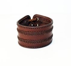 Brown Leather Cuff Bracelet With Wrist Strap, Handmade Brown Leather Bracelet For Everyday, Artisan Brown Leather Bracelets, Brown Leather Wristband, Casual Brown Cuff Bracelet As A Gift, Artisan Brown Leather Bracelet, Casual Brown Cuff Bracelet As Gift, Handmade Distressed Brown Leather Bracelets, Artisan Brown Leather Cuff Bracelet