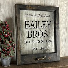 Journey back to Bedford Falls with the Bailey Brothers! This "It's a Wonderful Life" wall art is inspired by the classic and heart-warming 1946 movie. Bring a little bit of vintage, small town America to your home! For more items inspired by this and other beloved holiday classics, see all our Christmas inventory at https://www.etsy.com/shop/SecondChanceArt?ref=seller-platform-mcnav§ion_id=39222503 Hand crafted from vintage style glass and new wood, this unique art will make a special addition to your holiday decor! We make the frames in small batches from solid wood, and finish them with water-based stains.  We cut and install pieces of vintage look glass.  Vinyl decals are cut and applied, and a reproduction window pull is added.  -Window frame has a dark finish -Vintage look window pull Its A Wonderful Life Christmas Tree, It’s A Wonderful Life Decorations, Bedford Falls, It’s A Wonderful Life, Door Decorating Contest, It's A Wonderful Life, Unique Holiday Decor, Small Town America, 2024 Ideas