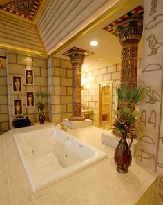 a large jacuzzi tub sitting inside of a bathroom