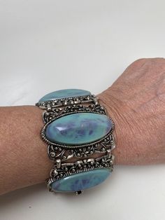 "Vintage SELRO Wide Bracelet 1950s Victorian Style Acrylic Teal Blue 7.5\" x 2\" Statement Bracelet Excellent vintage condition - Rare and Collectable Please zoom in on the pictures before bidding as they are part of the description. I leave the cleaning of all vintage jewelry to the new owner. Thank you for shopping!" Vintage Blue Oval Bracelet, Hallmarked Victorian Sterling Silver Bracelet, Luxury Victorian Style Hallmarked Sterling Silver Bracelet, Vintage Blue Nickel-free Bracelet, Vintage Nickel-free Turquoise Cuff Bracelet, Wide Bracelet, Mother Of Pearl Necklace, Statement Bracelet, Teal Blue