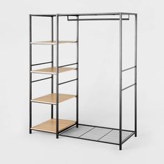 an open metal and wood shelving unit with shelves on each side, against a white background