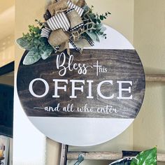 a wooden sign that says, bess this office and all the guests are welcome