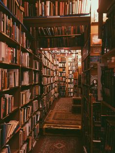 a long row of bookshelves filled with lots of books