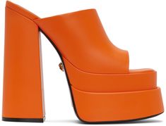 Buffed calfskin heeled sandals in orange. · Open square toe · Logo-embossed goatskin footbed · Covered block heel with rubber injection · Covered platform midsole · Signature Medusa hardware at calfskin outsole · Platform: H2.5 in · Heel: H6 in Supplier color: Orange Versace Sandals, Versace Heels, Block Heel Platform Sandals, Orange Sandals, Platform Block Heels, Orange Outfit, Platform Sandals Heels, Platform Heels, Dream Shoes