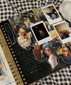 an open scrapbook with pictures of people and words on the pages, sitting on a checkered table cloth