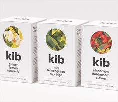 three boxes of kilb tea sitting next to each other