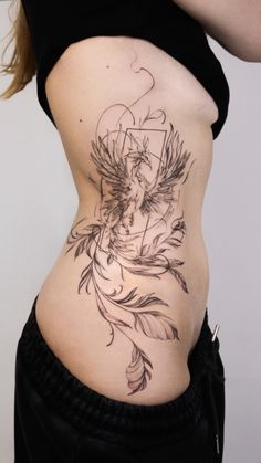 a woman with a tattoo on her stomach