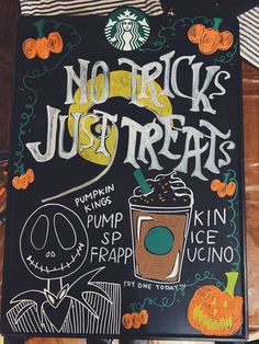 there is a sign that says no trick just treats and pumpkin juice on it,