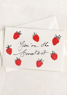 two cards with strawberries on them and the words you're sweet written in cursive writing