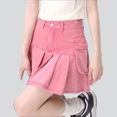 Introducing the 2023 Spring-Summer Collection's pink pleated cargo denim skirt ââ‚?a laid-back-style essential that'll take your wardrobe to the next level!Why It's The Must-Have Of The SeasonThis mid-rise skirt is patterned to make you stand out from the crowd. With its beautiful folded pattern and cargo pockets. it exudes a unique style that reflects a sophisticated streetwear attitude. The combination of the zipper and button closure adds an extra edge to the look. while the premium denim mat High Waist Pink Mini Skirt With Pockets, Pink Mini Skirt With Pockets For Spring, Spring Pink Mini Skirt With Pockets, Trendy Pink Skirt With Pockets, Pink Mini Denim Skirt With Pockets, Pink Denim Mini Skirt With Pockets, Summer Pink Mini Skirt With Pockets, Y2k Pink Bottoms With Pockets, Pink High-waisted Denim Skirt For Spring