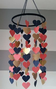 a mobile with hearts hanging from it