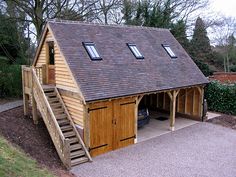 a garage with stairs leading up to it