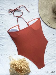 Lasaky - High Cut One Piece Swimsuit with Drawstring Ruched Trim and Criss Cross Neckline - Womens Swimwear in Elegant Brown - Premium Womens Clothing Summer Backless Swimwear With Drawstring, Solid Color One-piece Bodysuit For Beach, One-piece Solid Color Bodysuit For Beach, Brown Backless Swimwear For The Beach, Summer Bodysuit With Tie Back For Beach Season, Brown One-piece Swimwear For Summer, Stretch Tie Back Bodysuit For Beach, Stretch Tie-back Bodysuit For Beach, Summer One-piece Bodysuit With Tie Back