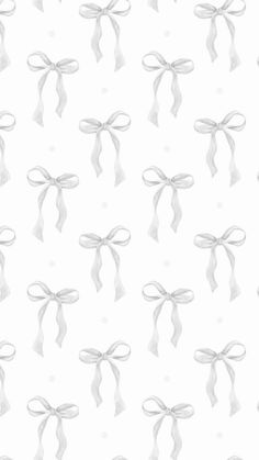 an image of white bows and ribbons on a white wallpaper background that is seamless