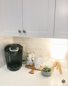 Cozy coffee corner, coffee station Kitchen Counter Styling Coffee Maker, Coffee Maker On Counter Ideas, Keurig Coffee Station On Counter, Small Lamps For Kitchen Counter, Kitchen Counter Lamp, Cozy Coffee Corner, Chalk Paint Coffee Table, Farmhouse Mantel Decor, Counter Top Decor